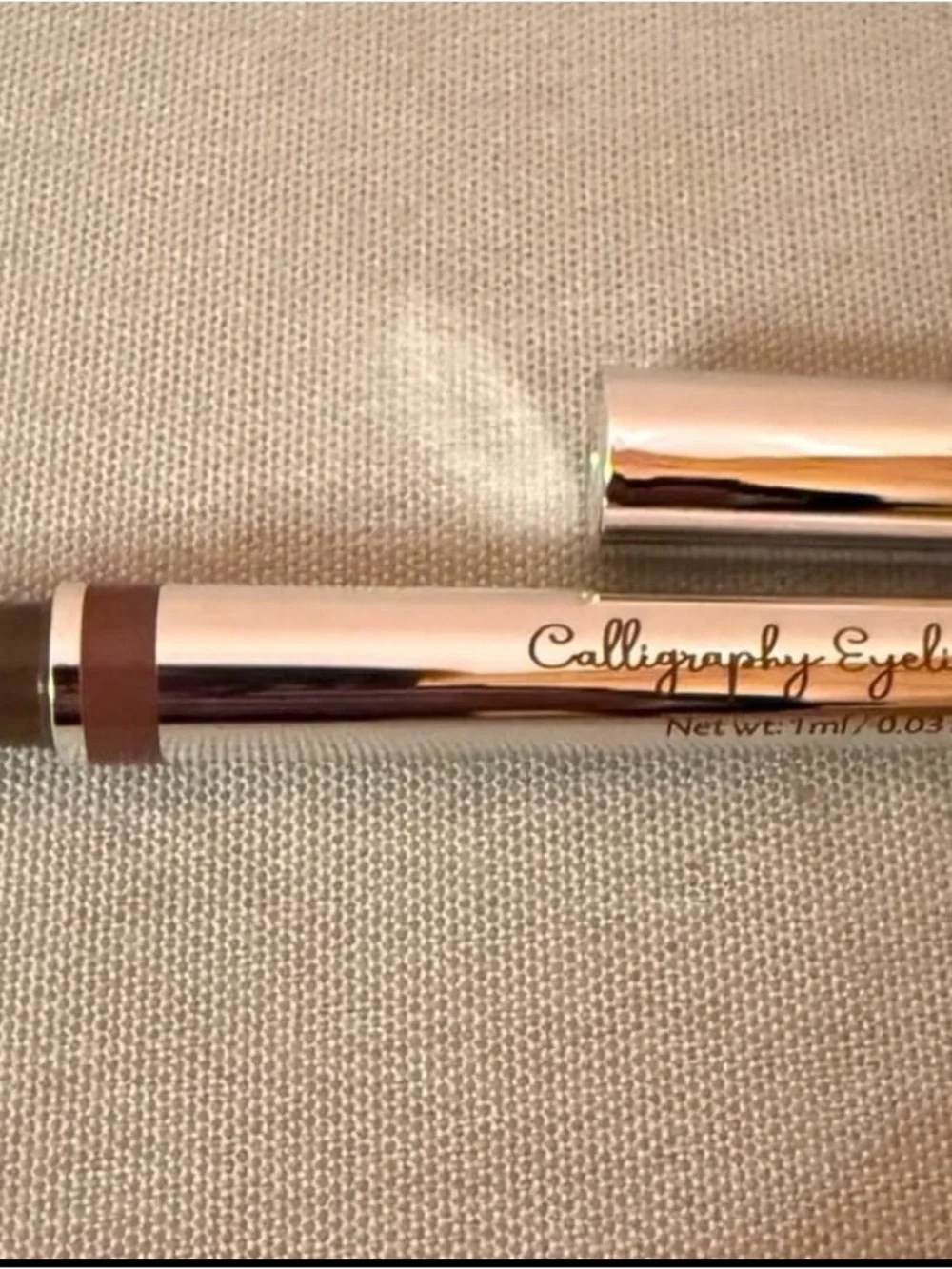 Pagevine calligraphy eyeliner pen in a brown shade.
